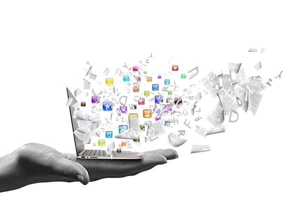Close up of hand with laptop and media icons-1