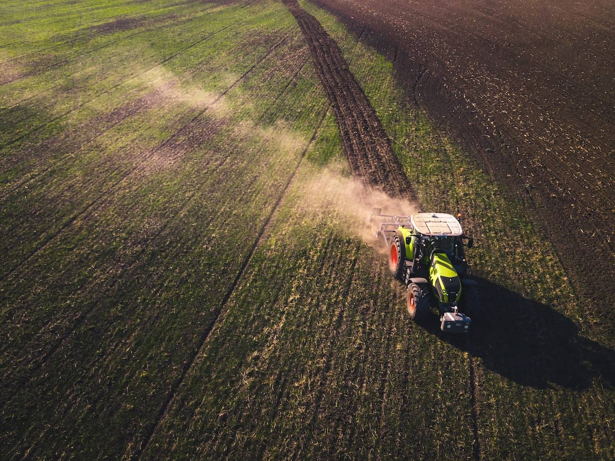 tractor spraying field